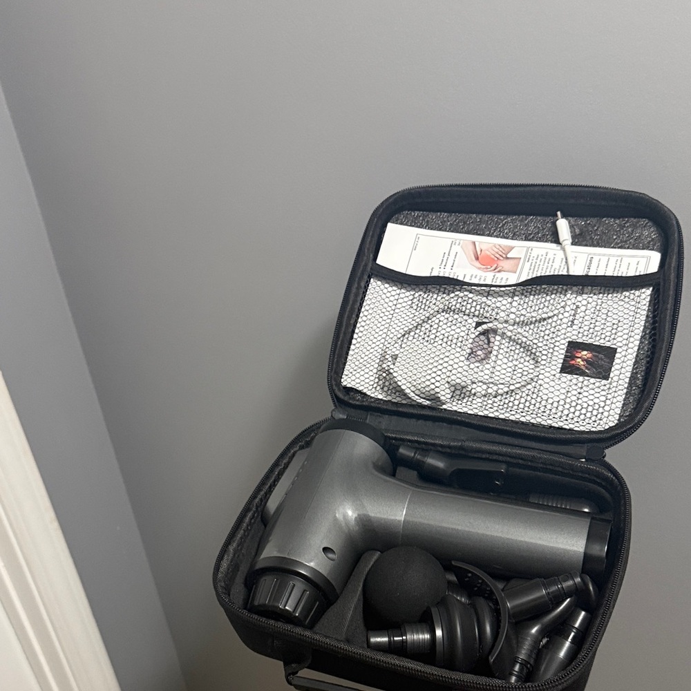 Gray Massage Gun with Accessories